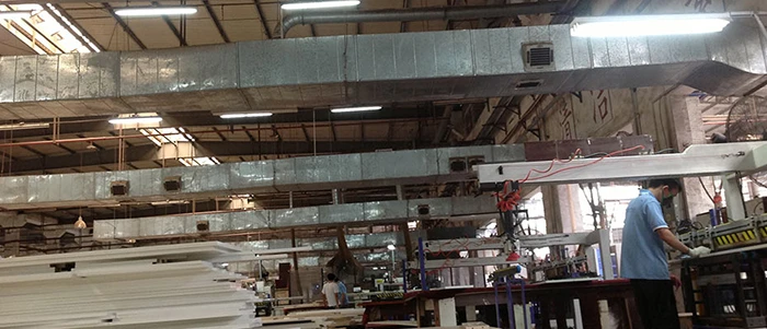 Indoor fresh air distribution ductwork supplying spot cooling air to operator stations